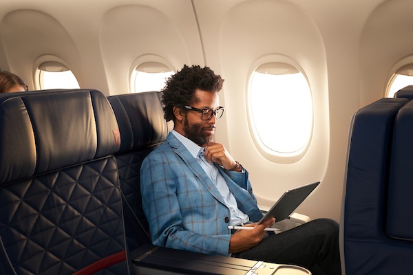A business traveler working on his tablet