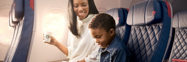 Woman and child sitting in Delta Comfort+